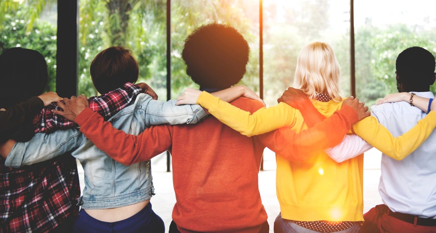 Friends walking together at a community gathering
